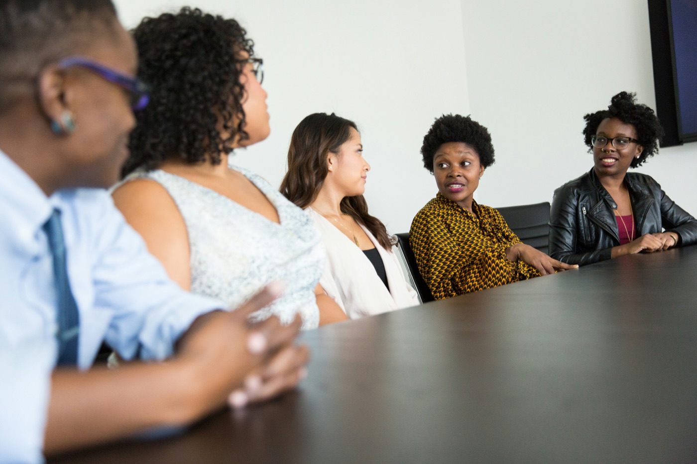 Leaders discussing a hiring process.